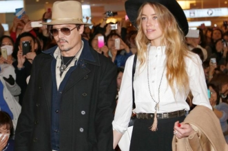 Doggie debacle Johnny Depp's wife charged with dogs to Australia