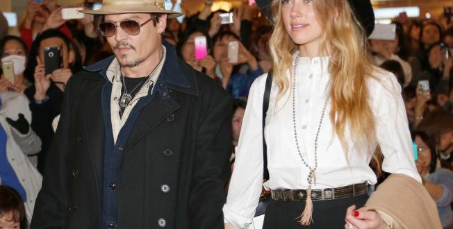 Doggie debacle Johnny Depp's wife charged with dogs to Australia