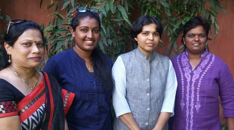 The four women from Pune who had almost climbed the platform where the Shani idol is kept. (Source: Express)